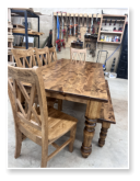 Custom built dining table in the Classic Farmhouse style built by Cattle Bend Woodworks.