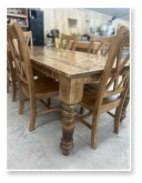 Custom built dining table in the Classic Farmhouse style built by Cattle Bend Woodworks.